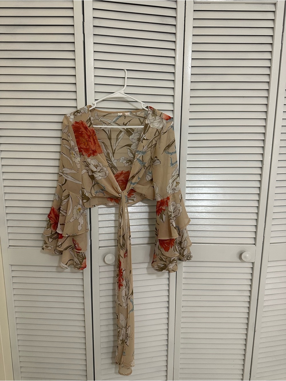 Luxe Beige Floral Tie-Front Crop Top with Ruffled Bell Sleeves